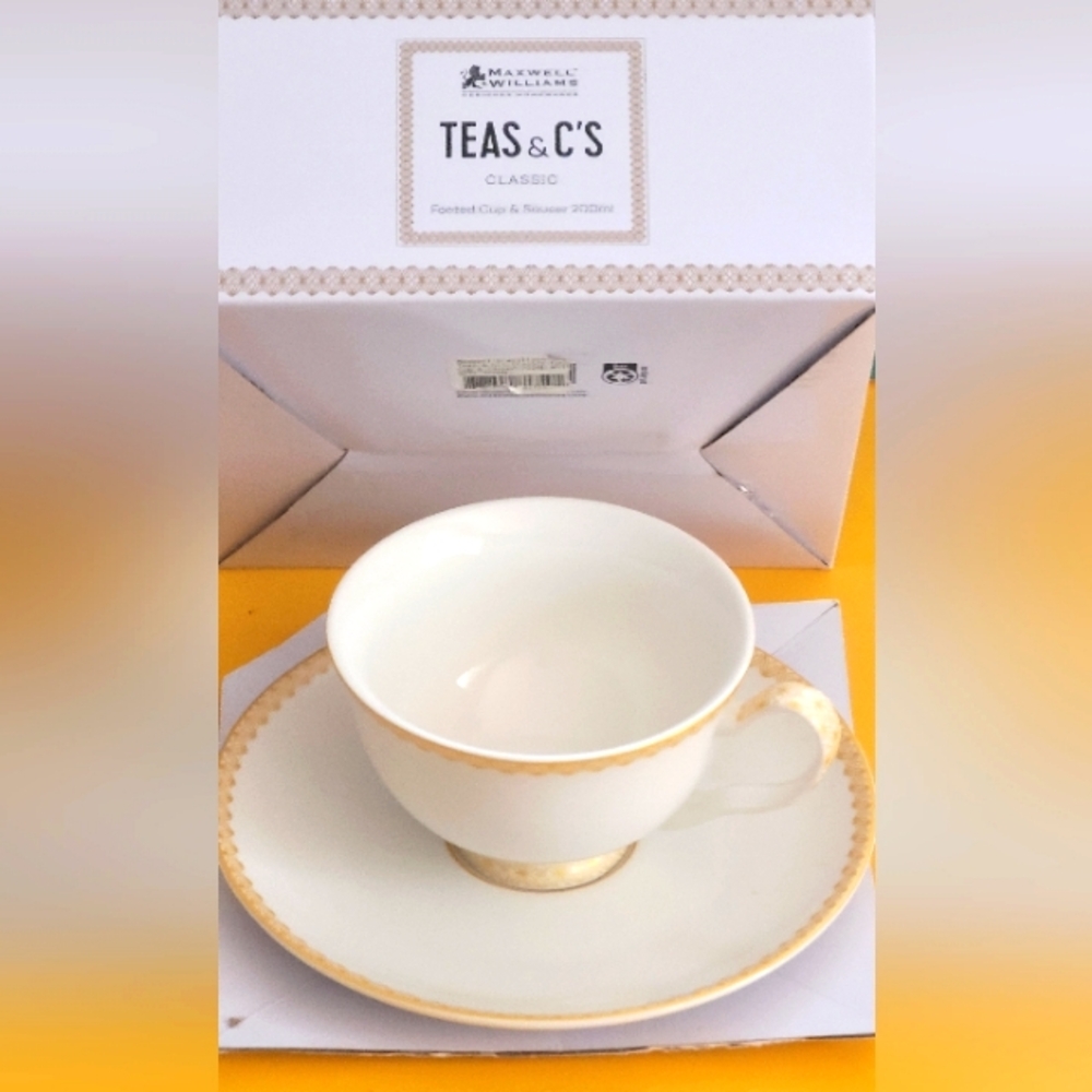 MAXWELL & WILLIAMS Elegant Gold and White Teacup and Saucer Set .